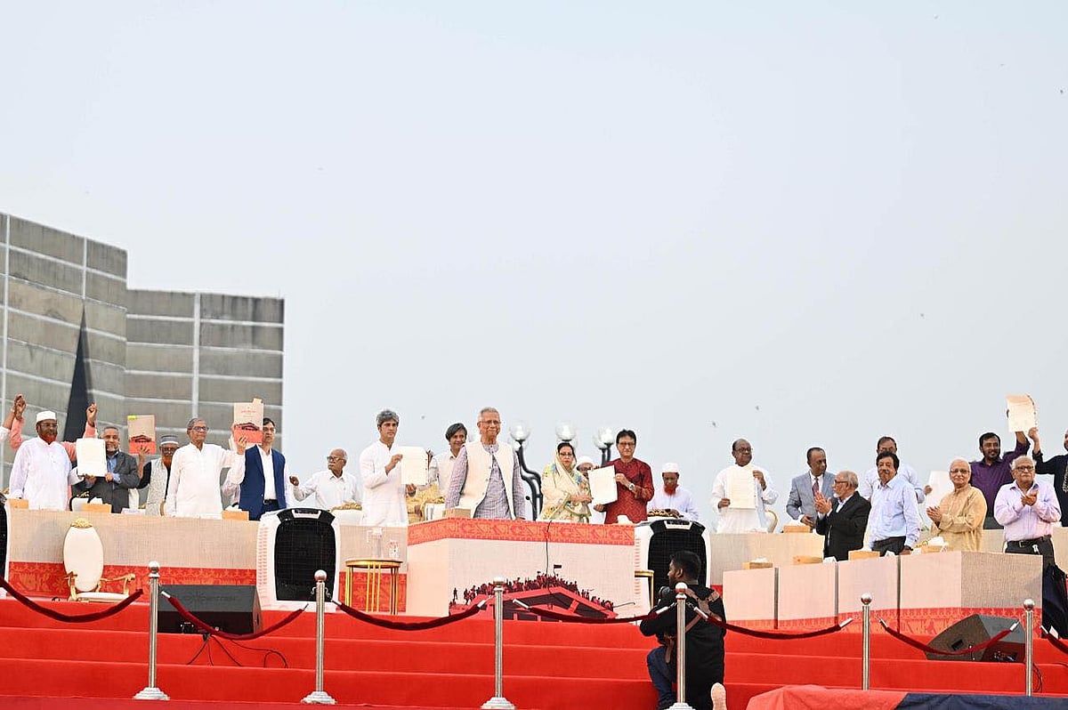 Leaders of different political parties show the signed July National Charter at South Plaza of National Parliament on 17 October 2025