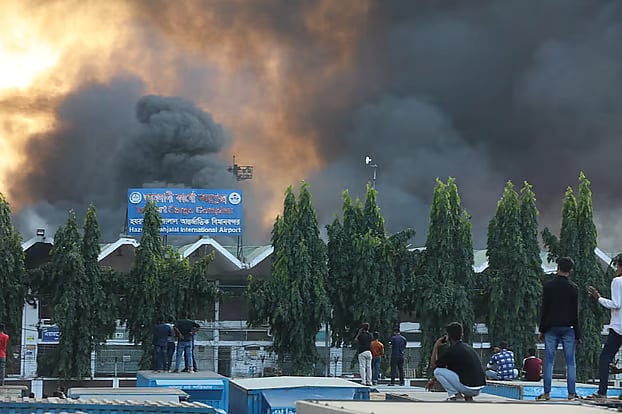 Fire rages through Dhaka airport's cargo village. Flights have been suspended. This afternoon (Saturday)
