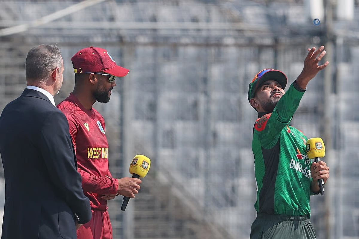 Mehidy Hasan Miraz tosses the coin