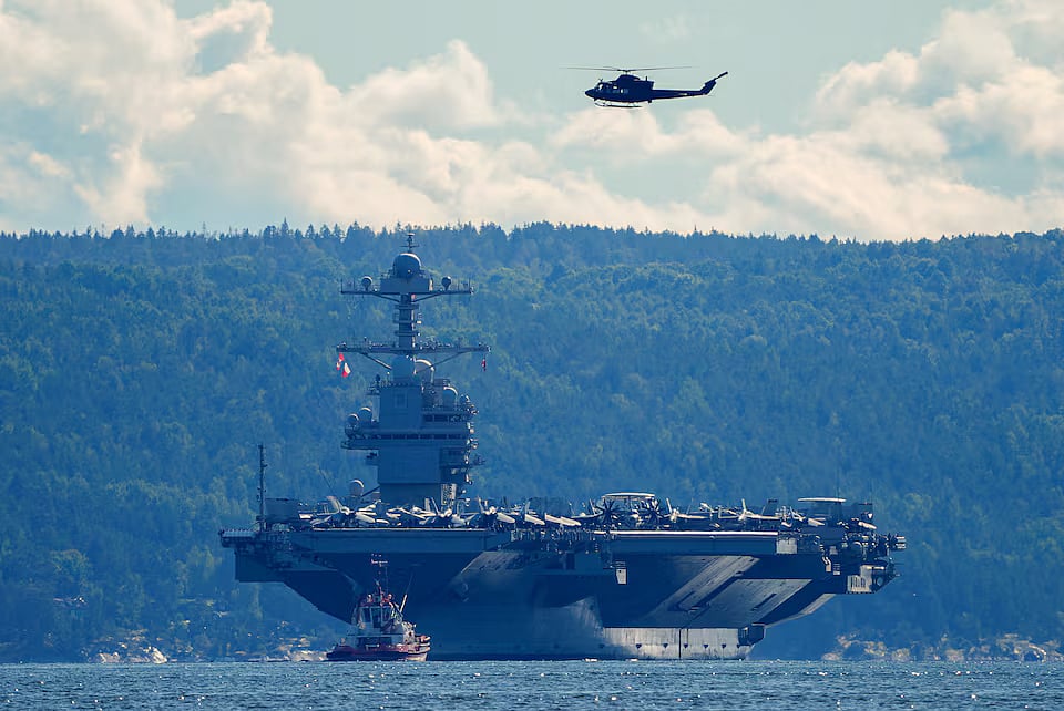 The world's largest warship, US aircraft carrier USS Gerald R Ford is seen in this file photo, on its way out of the Oslofjord at Nesodden and Bygdoy, Norway, 17 September, 2025.