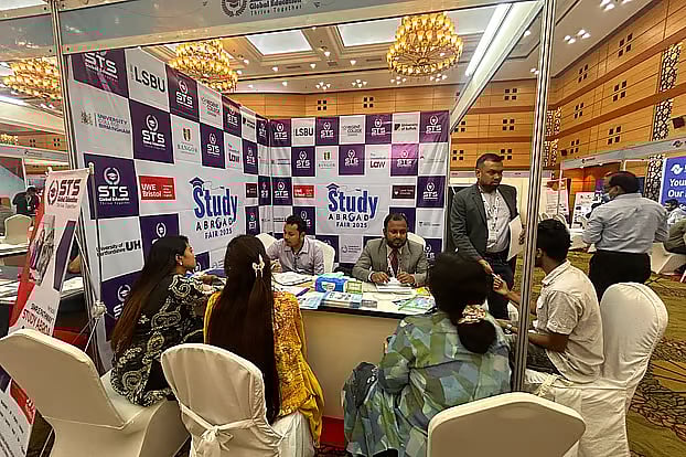 Crowds of information-seekers were seen at the stalls of participating institutions at the fair. The photo was taken on Saturday at the Bangladesh-China Friendship Conference Center in Agargaon, Dhaka.