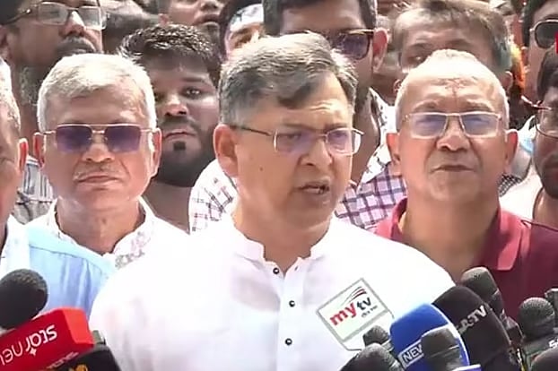 BNP standing committee member Salahuddin Ahmed speaks to  journalists after placing a flower wreath at the grave of Ziaur Rahman in Dhaka on 27 October 2025.