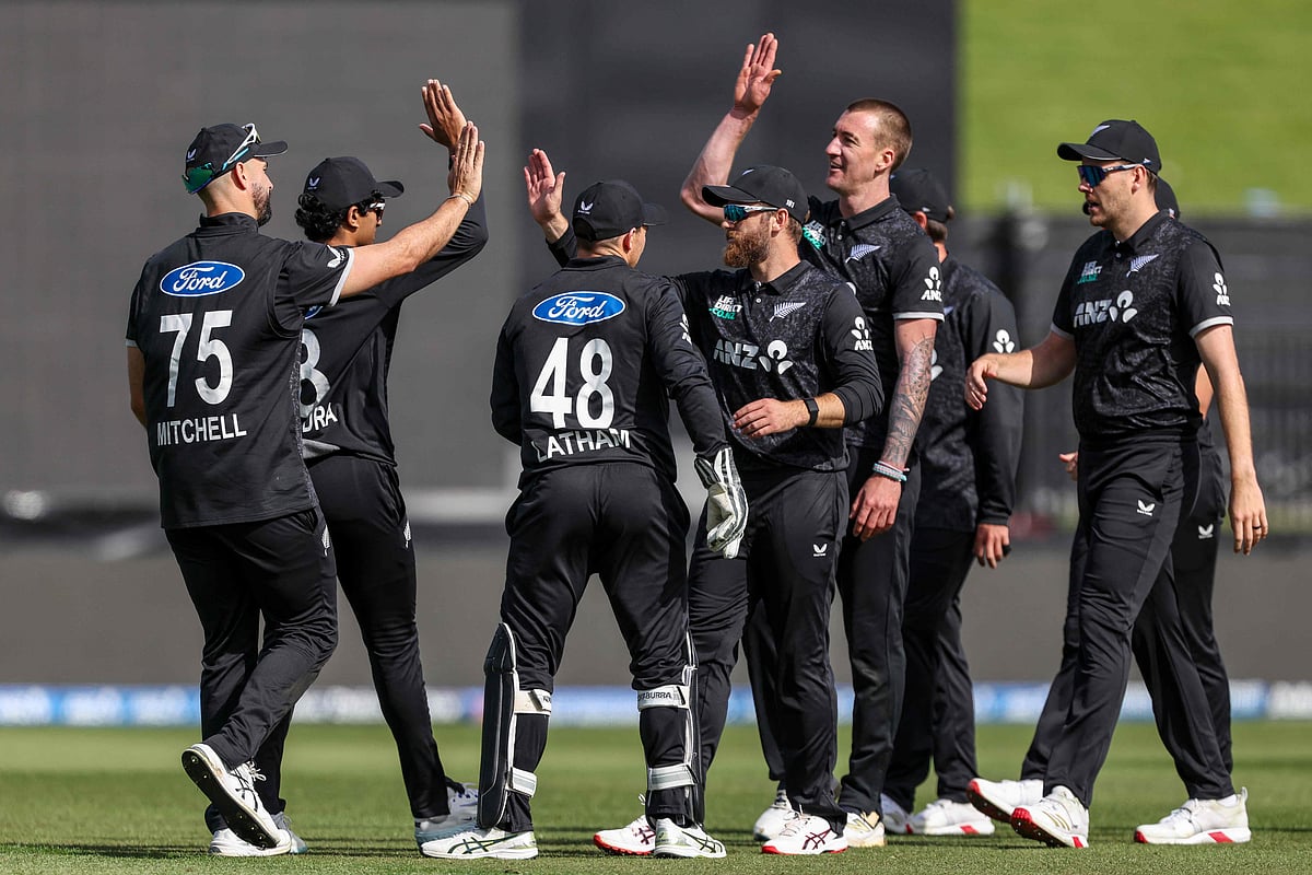 New Zealand's players celebrate a wicket during the second one-day international (ODI) cricket match between New Zealand and England at Seddon Park in Hamilton on 29 October, 2025