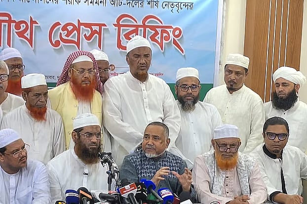 Leaders of eight like-minded parties, including Jamaat-e-Islami nayeb-e-ameer Syed Abdullah Muhammad Taher, at a press conference at the central office of the Khelafat Majlis in Purana Paltan, Dhaka, on Monday.