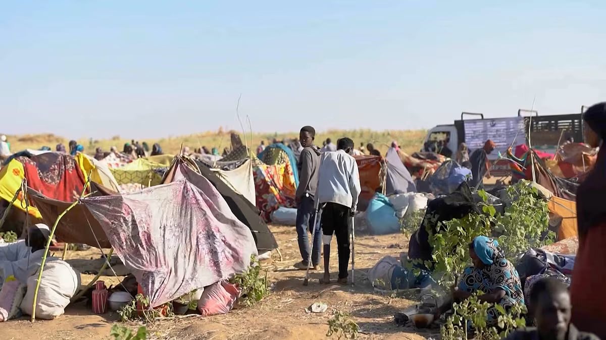 Displaced Sudanese gather and sit in makeshift tents after fleeing Al-Fashir city in Darfur, in Tawila, Sudan, 29 October, 2025, in this still image taken from a Reuters' video.