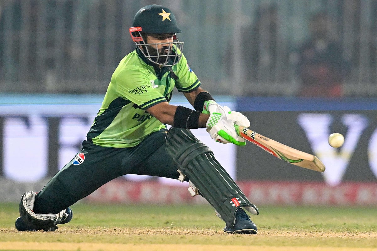 Pakistan's Mohammad Rizwan plays a shot during the first one-day international (ODI) cricket match between Pakistan and South Africa at the Iqbal Stadium in Faisalabad on 4 November, 2025