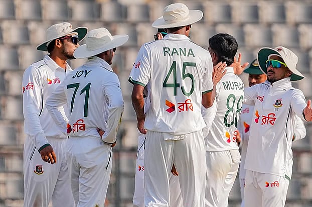 Bangladesh cricketers celebrates a wicket
