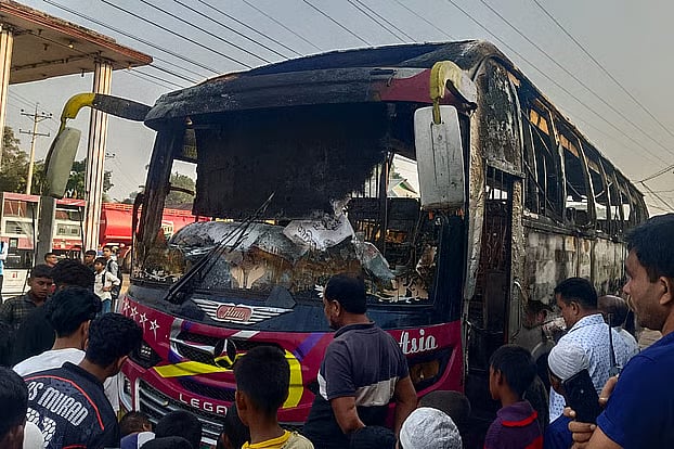 Miscreants set fire to a bus in the Bhalukjan area of Fulbaria upazila on Monday night. The photo was taken on Tuesday morning.