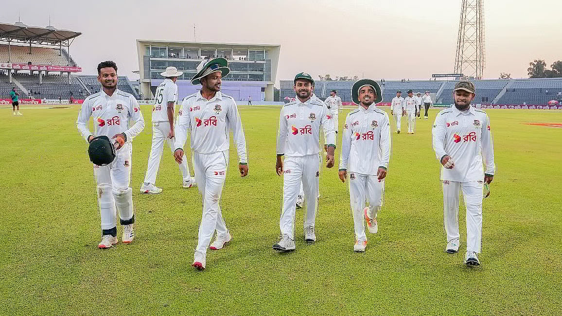Bangladesh players leaving the field after the day's match