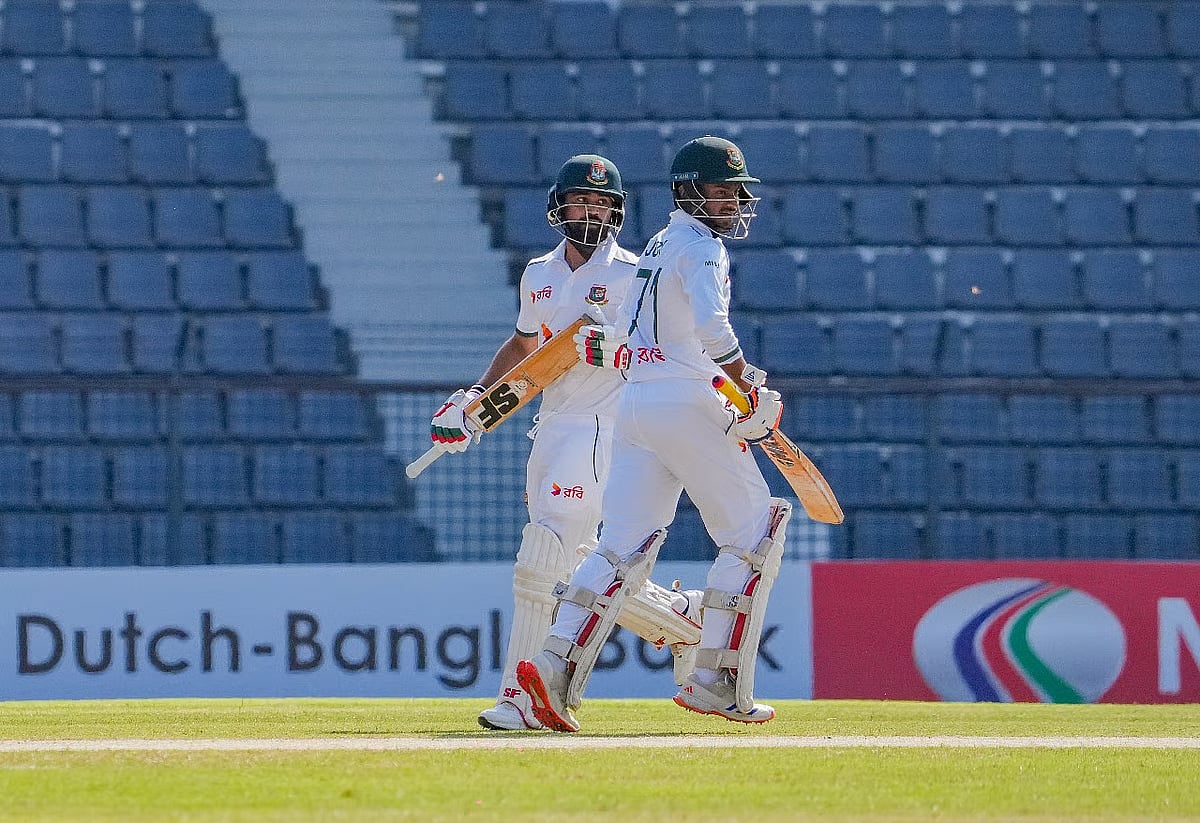 Openers Shadman Islam and Mahmudul Hasan Joy take a run in the first Test against Ireland at Sylhet International Stadium on 12 November 2025