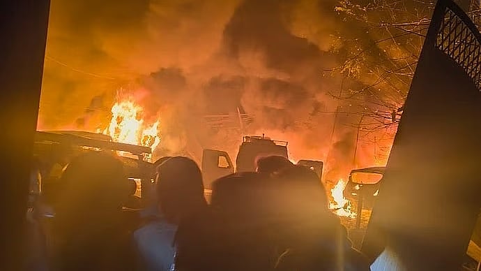 A large pile of confiscated explosives in a police station in India's Kashmir detonated late on Friday.