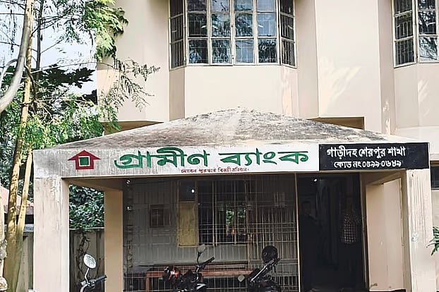 A signboard at the main gate of a Grameen Bank branch in Garidaha union of Sherpur upazila in Bogura was set on fire.