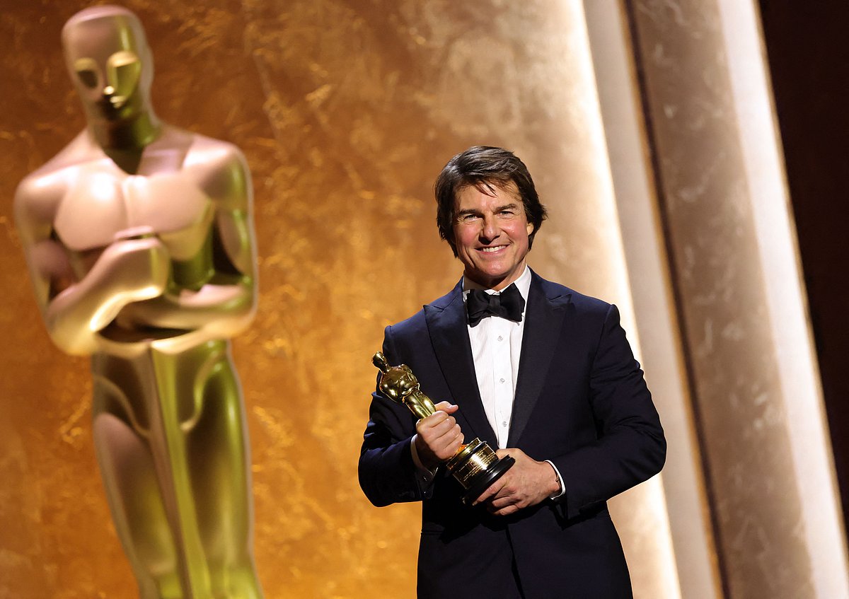 US actor producer Tom Cruise poses with his Honorary Academy Award on stage during the 16th Governors Awards at the Ray Dolby Ballroom at Ovation Hollywood in Los Angeles on 16 November, 2025.