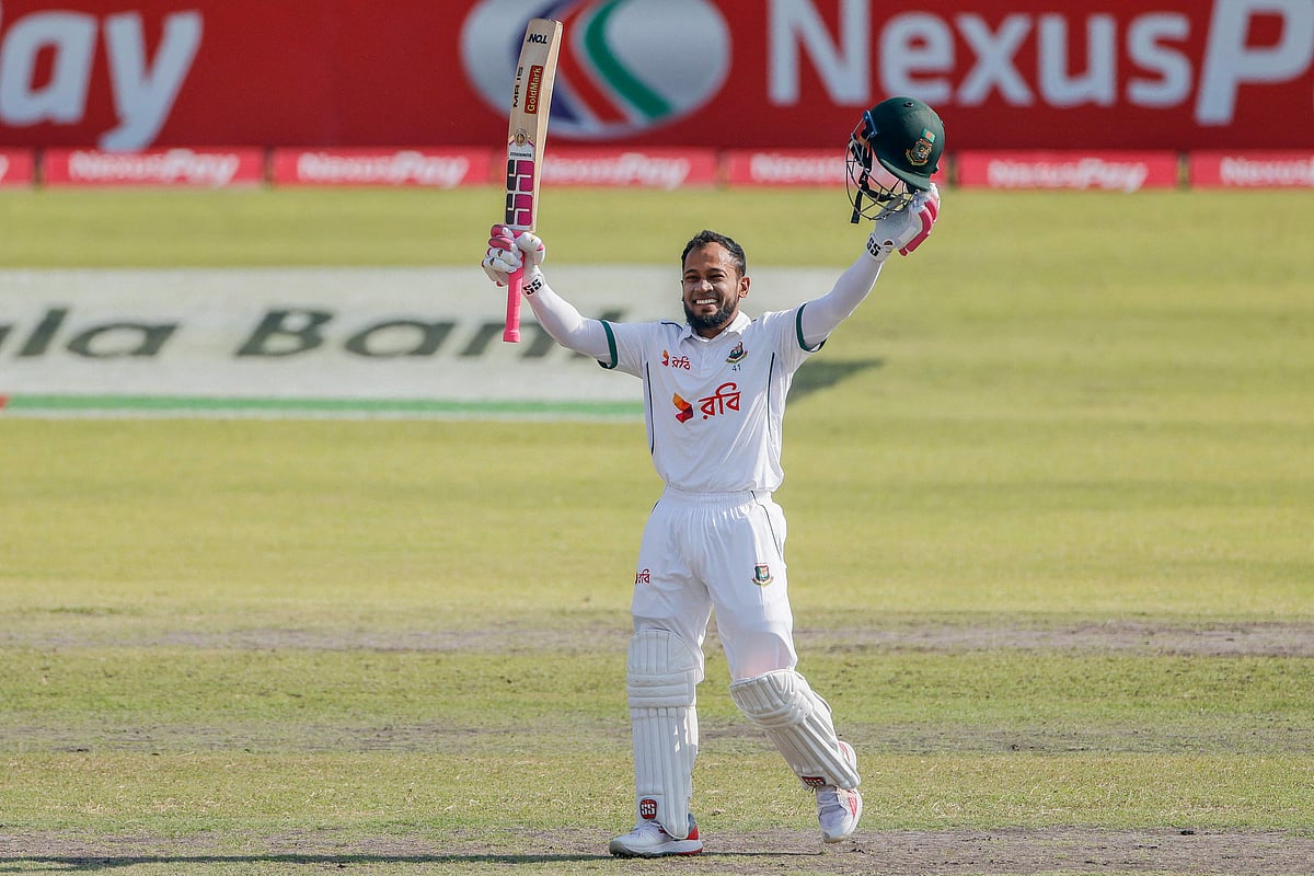 Bangladesh's Mushfiqur Rahim celebrates after scoring a century (100 runs) during the second day of the second Test cricket match between Bangladesh and Ireland at the Sher-e-Bangla National Cricket Stadium in Dhaka on November 20, 2025