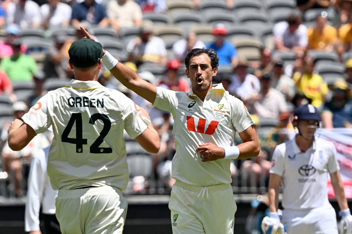 Australia’s Mitchell Starc celebrates the wicket of England’s Ben Stokes on day 1 of the first Ashes cricket Test match between Australia and England at Perth Stadium in Perth on 21 November, 2025.