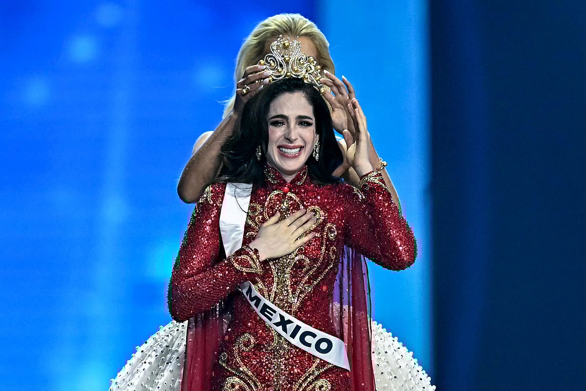 Miss Mexico Fatima Bosch (C) is crowned as she celebrates winning the 2025 Miss Universe pageant in Nonthaburi, north of Bangkok, on November 21, 2025