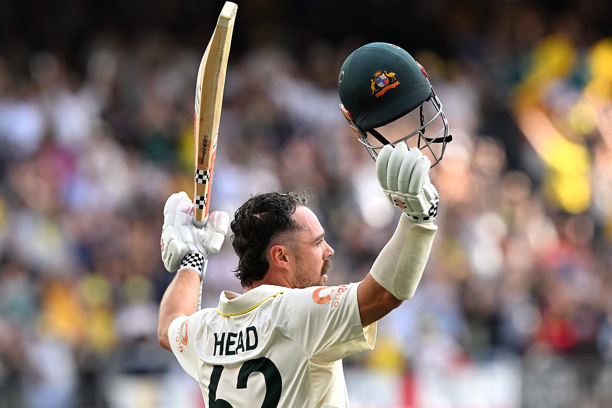Australia’s Travis Head acknowledges the applause from spectators as he walks back after his dismissal on day 2 of the first Ashes cricket Test match between Australia and England at Perth Stadium in Perth on 22 November, 2025.
