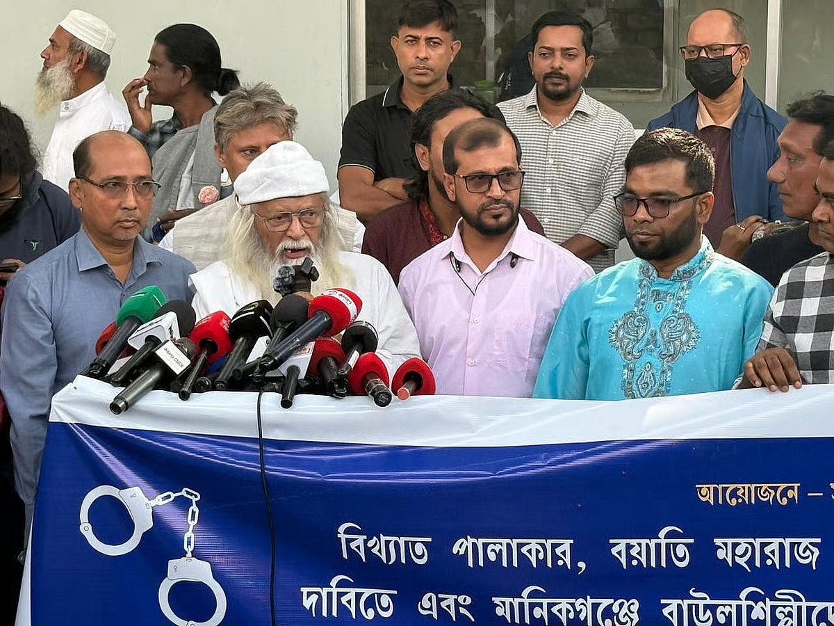 Farhad Mazhar addresses a protest gathering in front of the National Press Club in Dhaka, organised by Sadhuguru Bhakta O Oli-Awliya Ashekan Parishad on 24 November 2025 to demand the release of Abul Sarker and to protest the assault on baul artistes