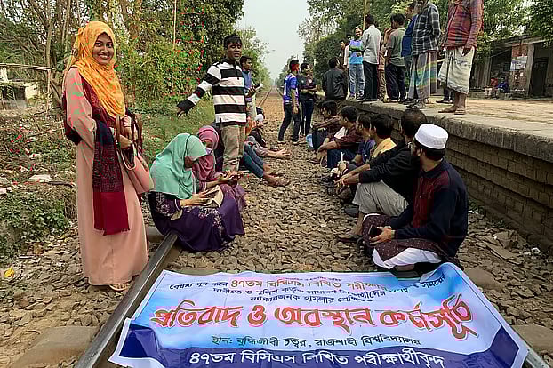 Students blocked the railway tracks in Rajshahi demanding that the 47th BCS written examination be postponed. Station Bazar railway line, Rajshahi; 23 November