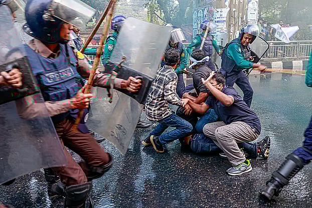 Police used water cannon and batons to break up the protest by candidates demanding the postponement of the 47th BCS written exam at Shahbagh on Tuesday afternoon