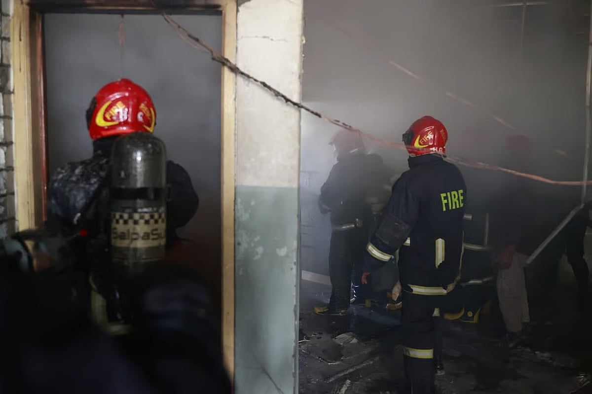 Firefighters working to douse the fire at Bangladesh Medical University, Dhaka on 26 November 2025