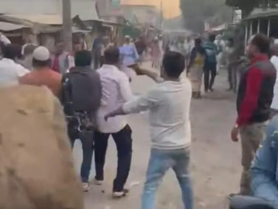 A youth fire shots during a clash between BNP and Jamaat in Pabna on 27 November 2025.