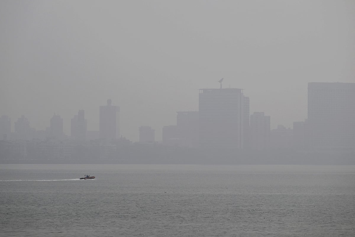 A speedboat is pictured in the Arabian sea amidst smog in Mumbai on 28 November 2025.