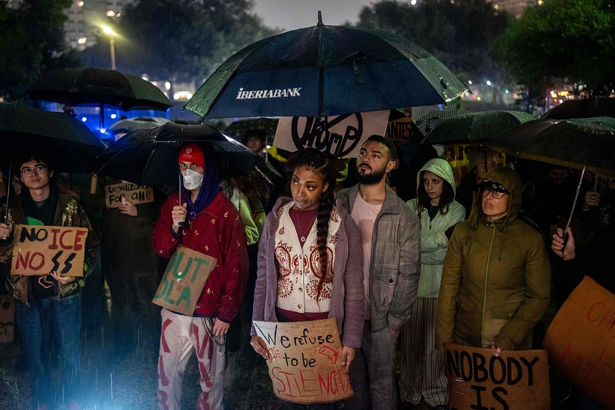 People protest against the ICE and Border Patrol operation outside of City Hall in New Orleans, Louisiana, on 1 December 2025.
