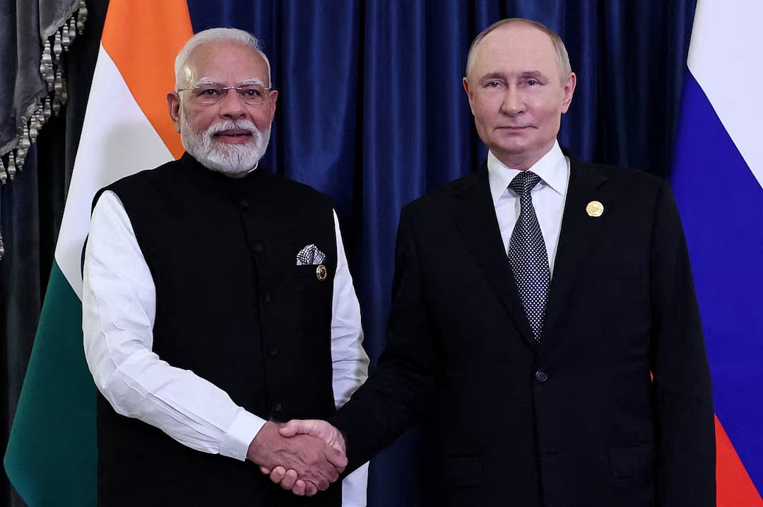 Russian President Vladimir Putin and Indian Prime Minister Narendra Modi shake hands during a meeting on the sidelines of the Shanghai Cooperation Organisation (SCO) summit in Tianjin, China, 1 September, 2025.
