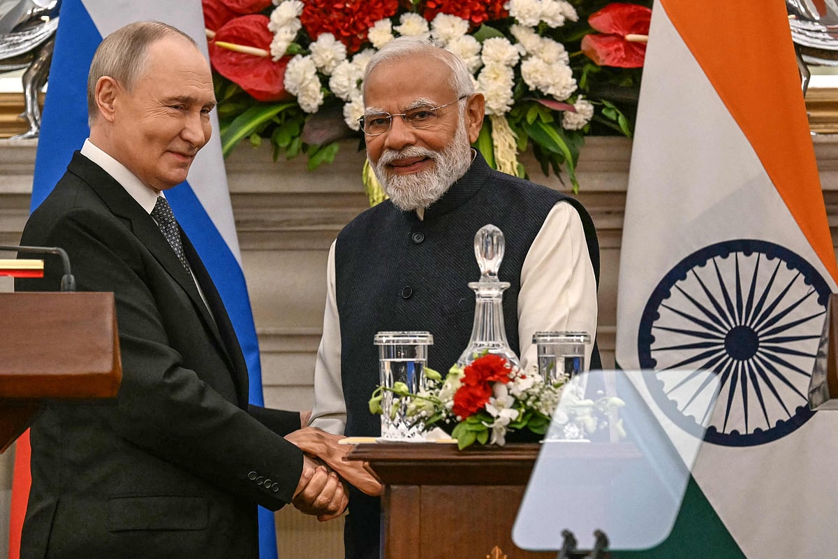 Russia’s President Vladimir Putin (L) speaks with India’s Prime Minister Narendra Modi after their joint press statements at the Hyderabad House in New Delhi on 5 December 2025. India’s Prime Minister Narendra Modi hosted Russia’s President Vladimir Putin on 5 December, with defence and trade ties centre stage as New Delhi faces heavy US pressure to stop buying Moscow’s oil