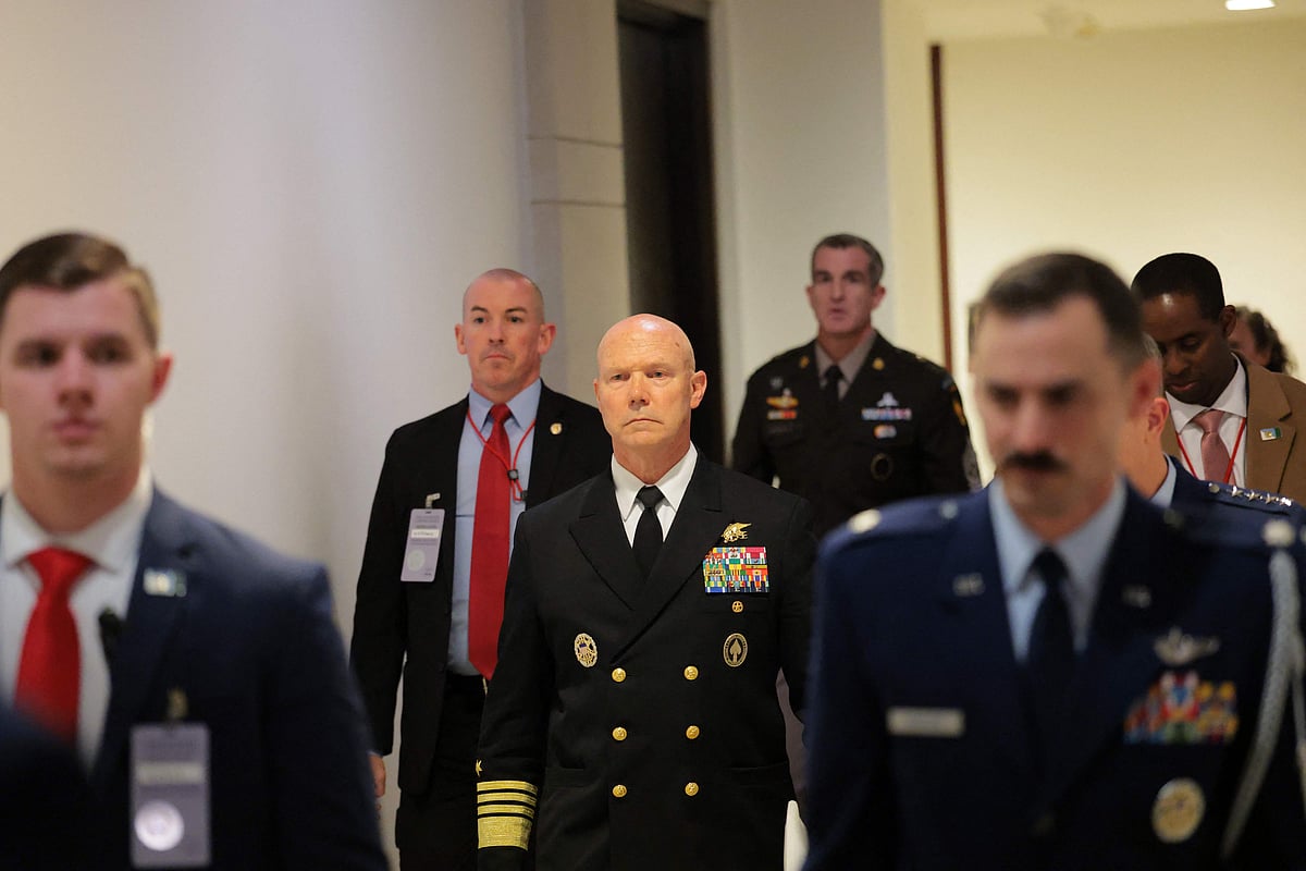Navy Adm. Frank Bradley departs from the US Capitol Building on 4 December, 2025 in Washington, DC. Members of the Senate and House Armed Services and Intelligence committees met with Bradley in closed door classified meetings to discuss the strikes on suspected drug boats out of Venezuela ordered by the Trump Administration.