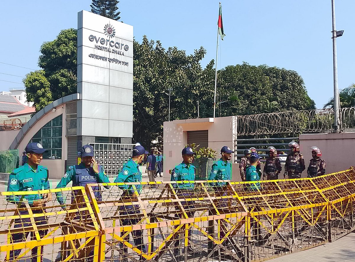 Security has been beefed up as BNP leaders and activists, members of its affiliate organisations, as well as ordinary citizens throng outside the Evercare Hospital in Dhaka to enquire about the health of BNP chairperson and former prime minister Khaleda Zia. The photo is taken on 7 December 2025