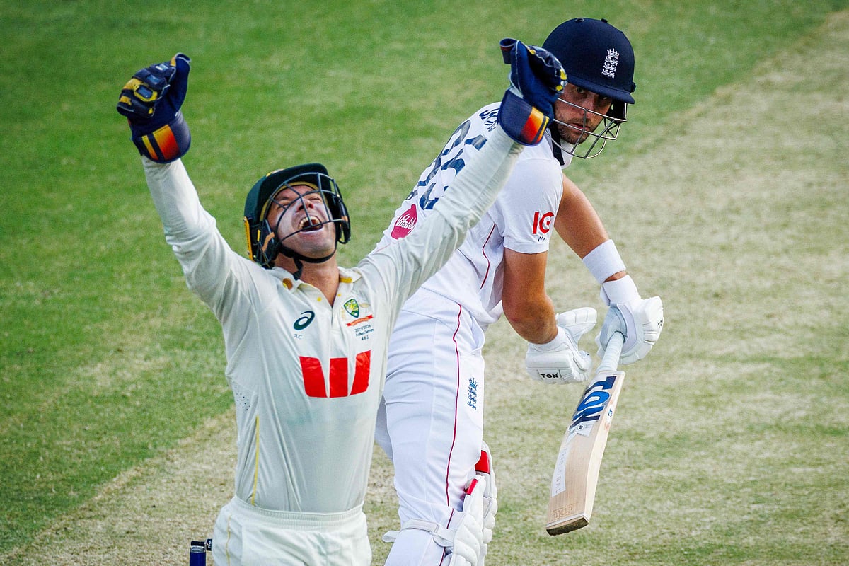 Australia's Alex Carey celebrates the wicket of England's Will Jacks on day four of the second Ashes cricket Test match between Australia and England at The Gabba in Brisbane on 7 December, 2025.