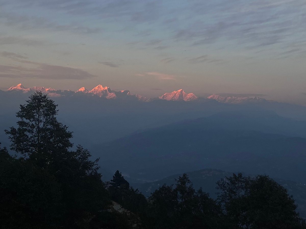 Changing hues of the Himalayan peaks at sunrise