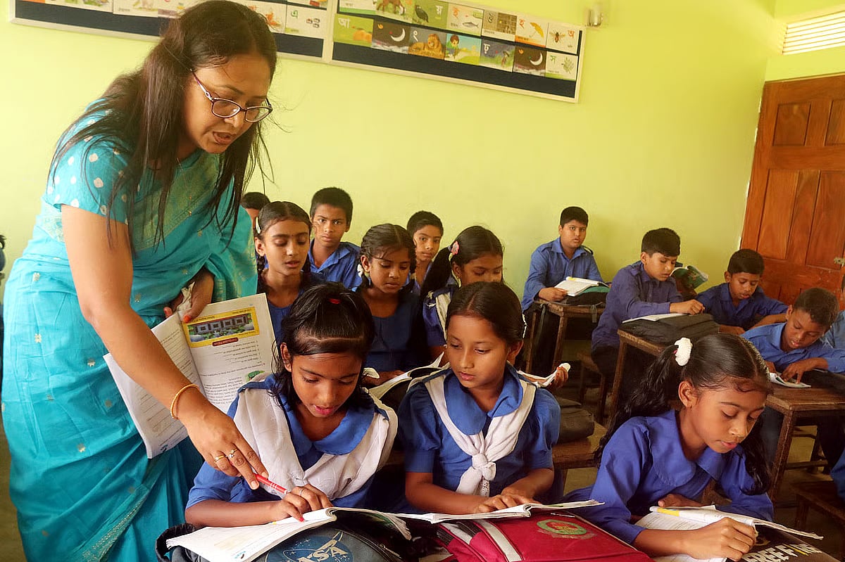 A teacher conducts a class at Uttam Bagharia Government Primary School in Rangpur.