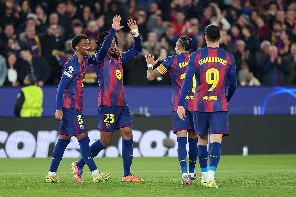 Barcelona's French defender Jules Kounde celebrates with his team