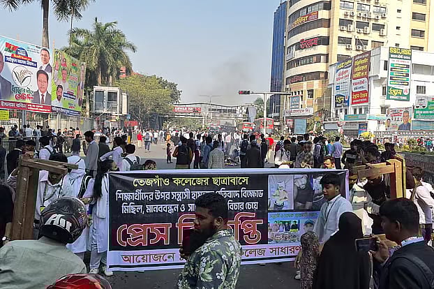 A group of students blocked roads in the Farmgate area of the capital to protest, bringing traffic to a standstill and causing severe congestion