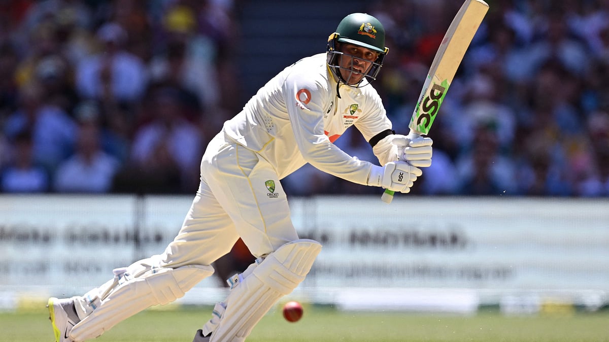 Australia's Usman Khawaja plays a shot on the first day of the third Ashes cricket Test match between Australia and England at the Adelaide Oval in Adelaide on 17 December 2025