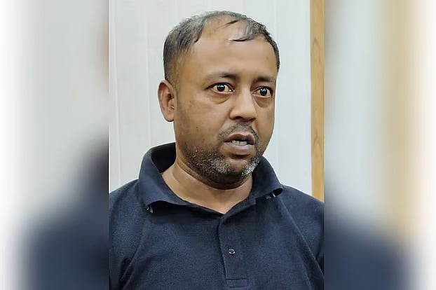 Driver Abdul Awal held a joint secretary hostage inside a car and drove him around various parts of Dhaka for four hours. He has been arrested by Sher-e-Bangla Nagar police.