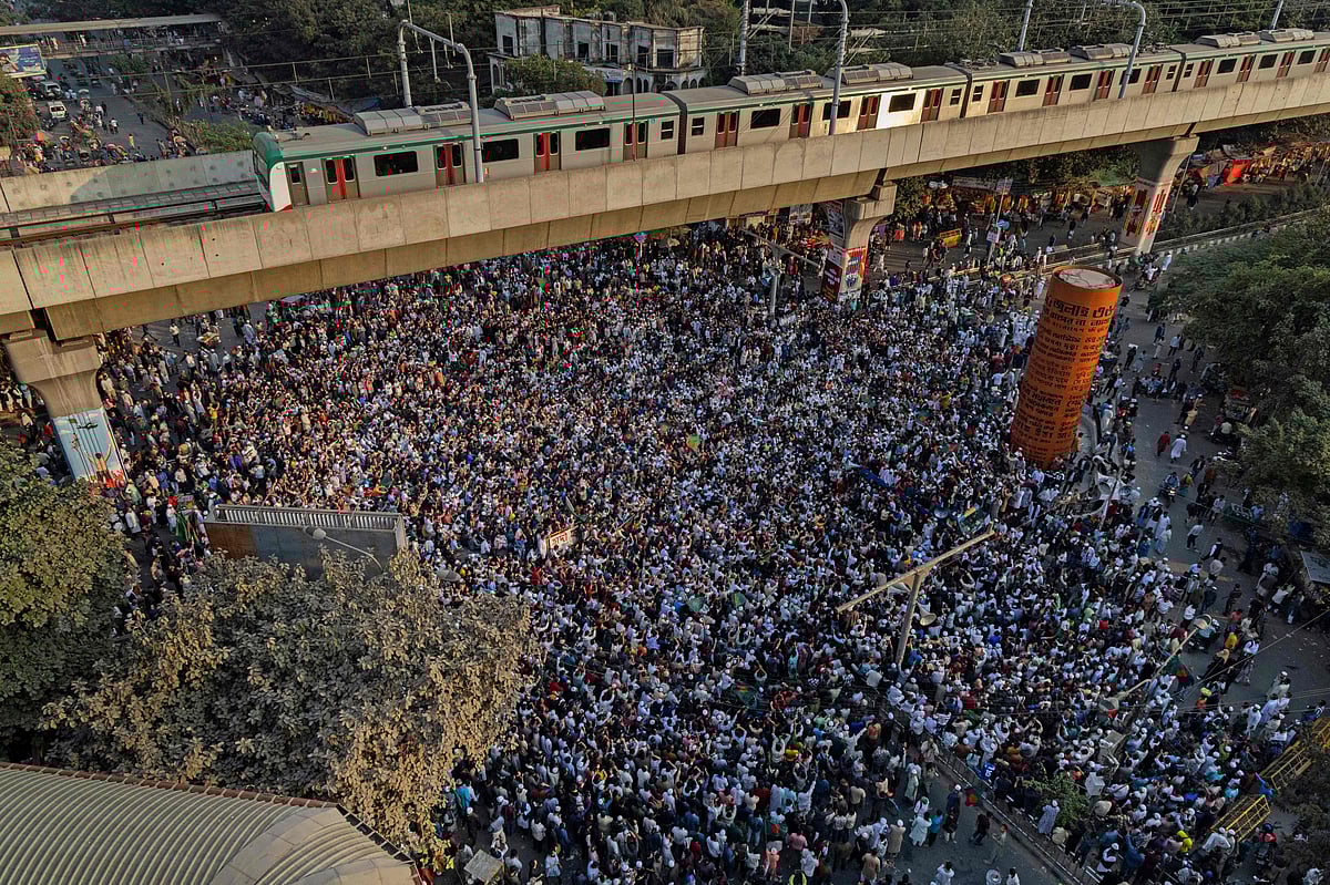 An aerial view shows protesters at Shahbagh intersection in Dhaka on 19 December 2025, following the death of youth leader Sharif Osman Hadi. Protesters rallied across Bangladesh on December 19 for a second straight day calling for the arrest of the gunmen who shot and killed a key figure in last year's pro-democracy uprising.