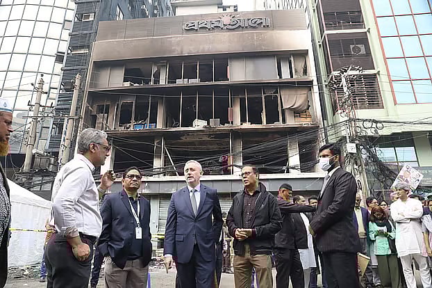 European Union Ambassador Michael Miller stands in front of the Prothom Alo building, damaged in an attack and arson carried out by miscreants. He observed the situation there. Sunday afternoon, Karwan Bazar in the capital