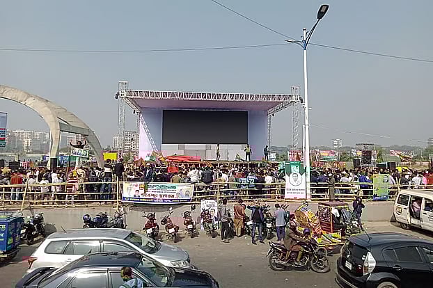A massive 48-foot by 36-foot stage is being built with bamboo and wood in the 300-foot area of Purbachal for the public reception of Tarique Rahman.