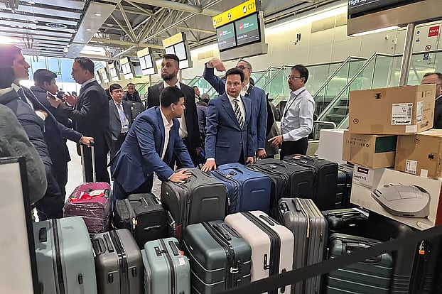 BNP acting chairman’s special assistant Abdur Rahman Sunny and Kamal Uddin, coordinator of the Ziaur Rahman Foundation, Europe, are seen checking in luggage at Heathrow Airport.
