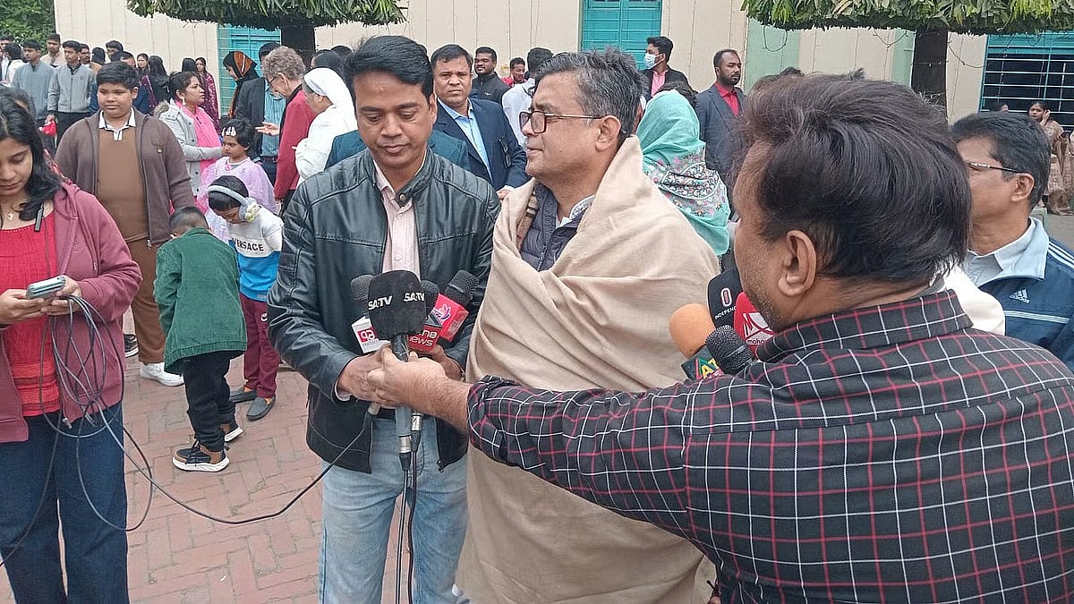 Chief adviser’s press secretary Shafiqul Alam talks to newspersons after visiting the Holy Rosary Church in Tejgaon, Dhaka, today Thursday, to exchange Christmas greetings with members of the Christian community
