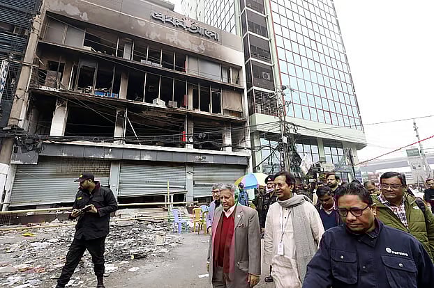 Brigadier General (Retd.) M Sakhawat Hossain, Shipping Advisor, visited the charred Prothom Alo office following the attack on Sunday morning.