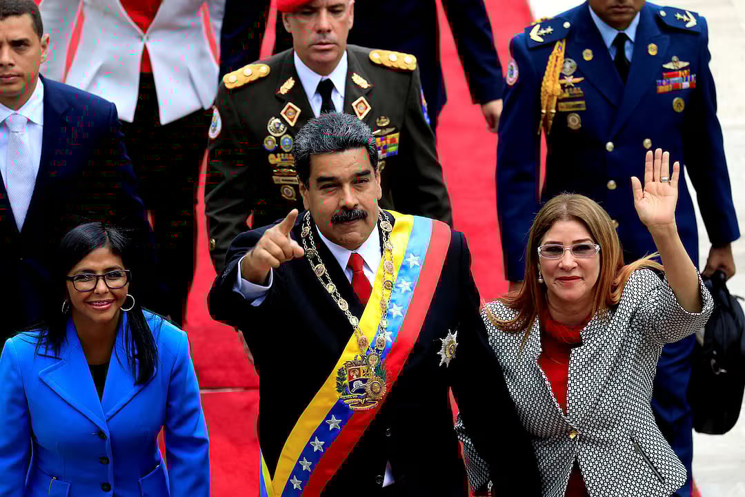 Venezuela's President Nicolas Maduro, flanked by his wife Cilia Flores and National Constituent Assembly President Delcy Rodriguez, arrives for a special session of the National Constituent Assembly to take oath as re-elected President at the Palacio Federal Legislativo in Caracas, Venezuela 24 May, 2018.