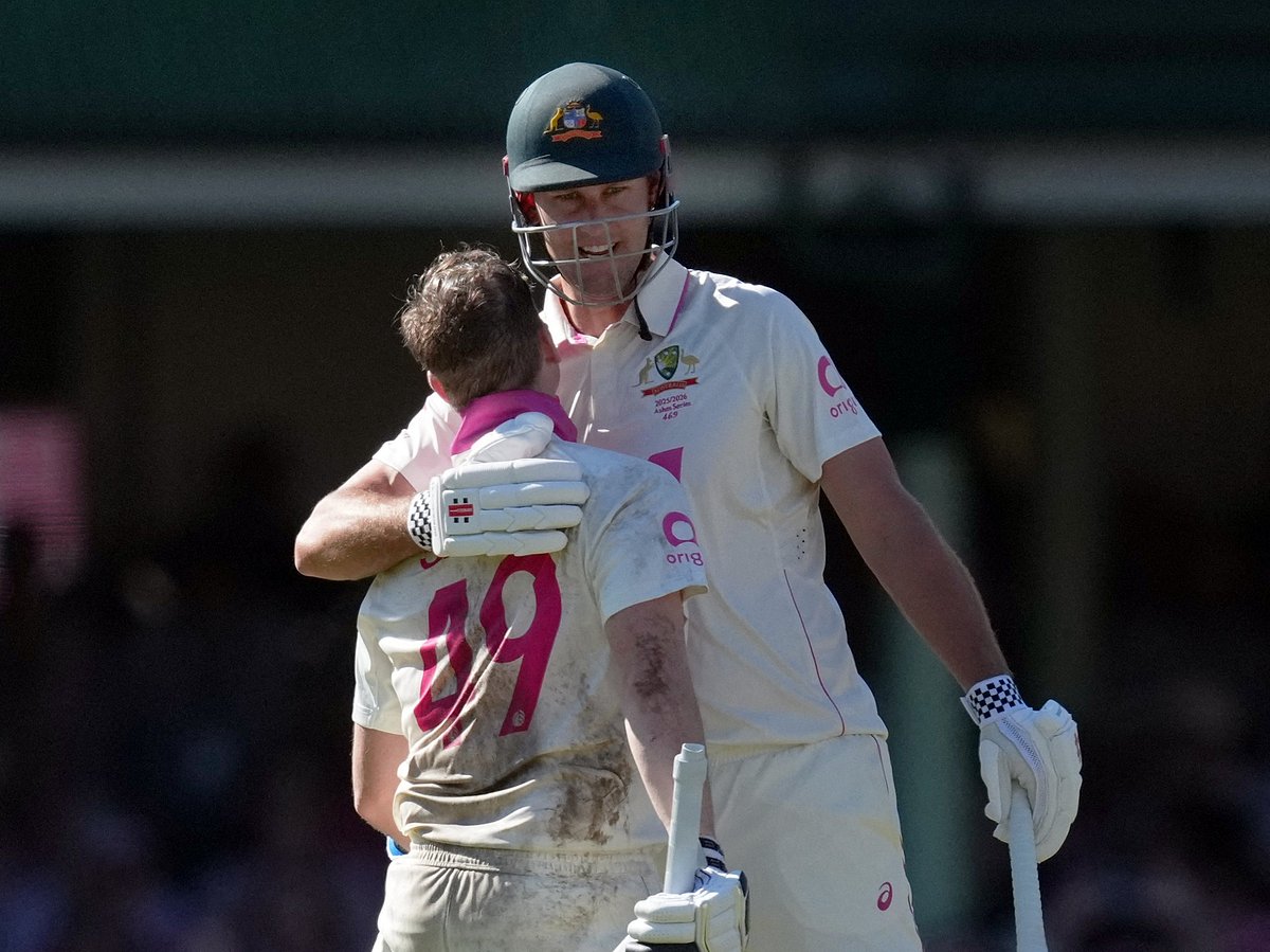 Australia's Steven Smith celebrates with Beau Webster after reaching his century. The Ashes - Australia v England - Fifth Test - Sydney cricket ground, Sydney, Australia. On 6 January, 2026