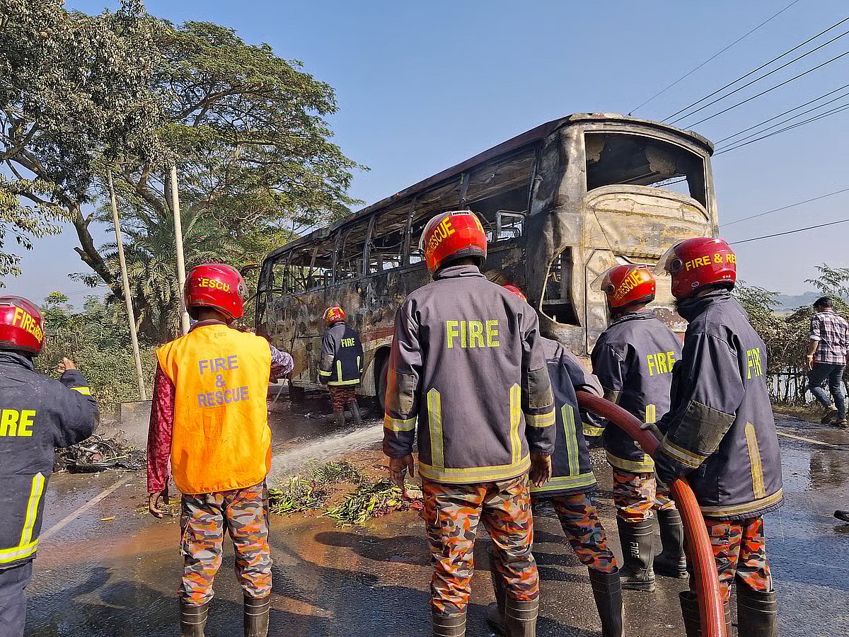 Fire service members douse the fire that broke out following a collision of three vehicles in Daudkandi, Cumilla on Dhaka-Chattogram highway on 9 January 2026