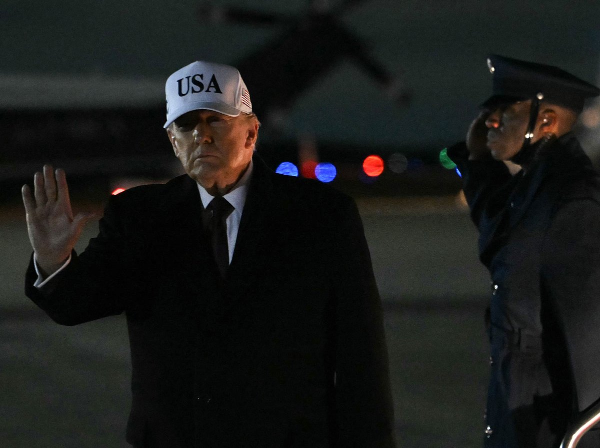 US President Donald Trump waves as he walks to board Marine One at Joint Base Andrews in Maryland on 11 January, 2026.