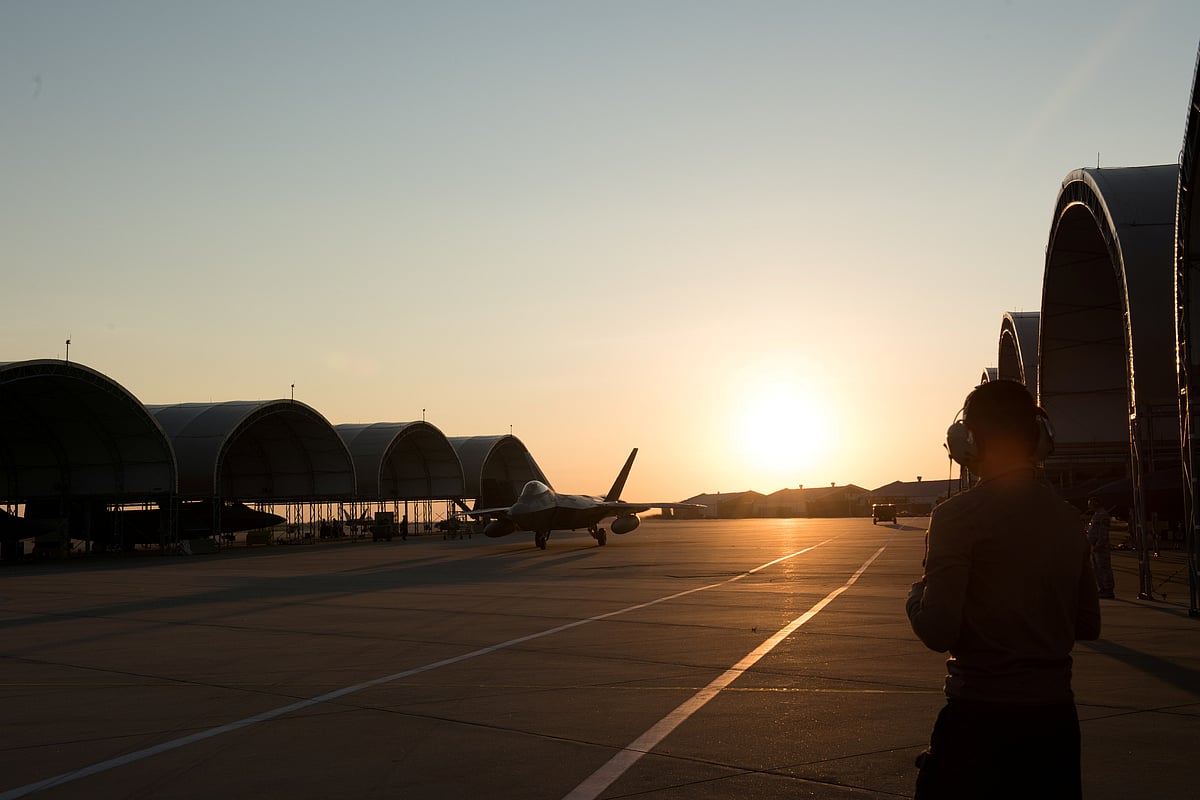 An F-22 Raptor from the 1st Fighter Wing, 27th Fighter Squadron taxis for departure deployment to Al Udeid Air Base, Qatar, from Joint Base Langley-Eustis, Virginia, US, 24 June 2019.